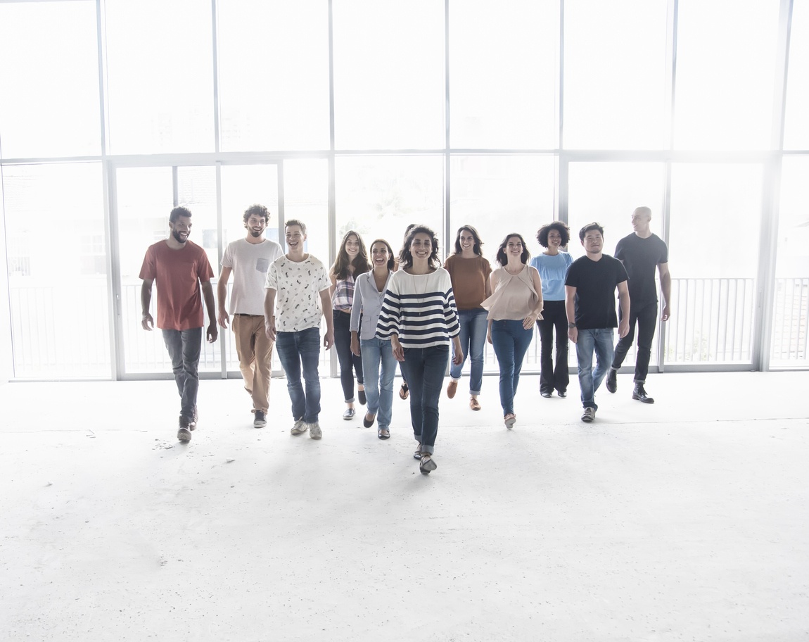 Group of individuals walking forward